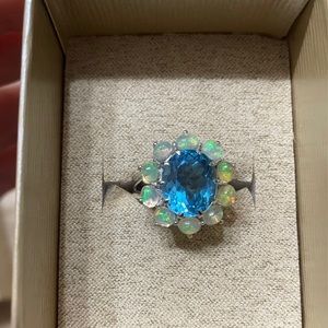 Swiss blue topaz and Ethiopian opal ring